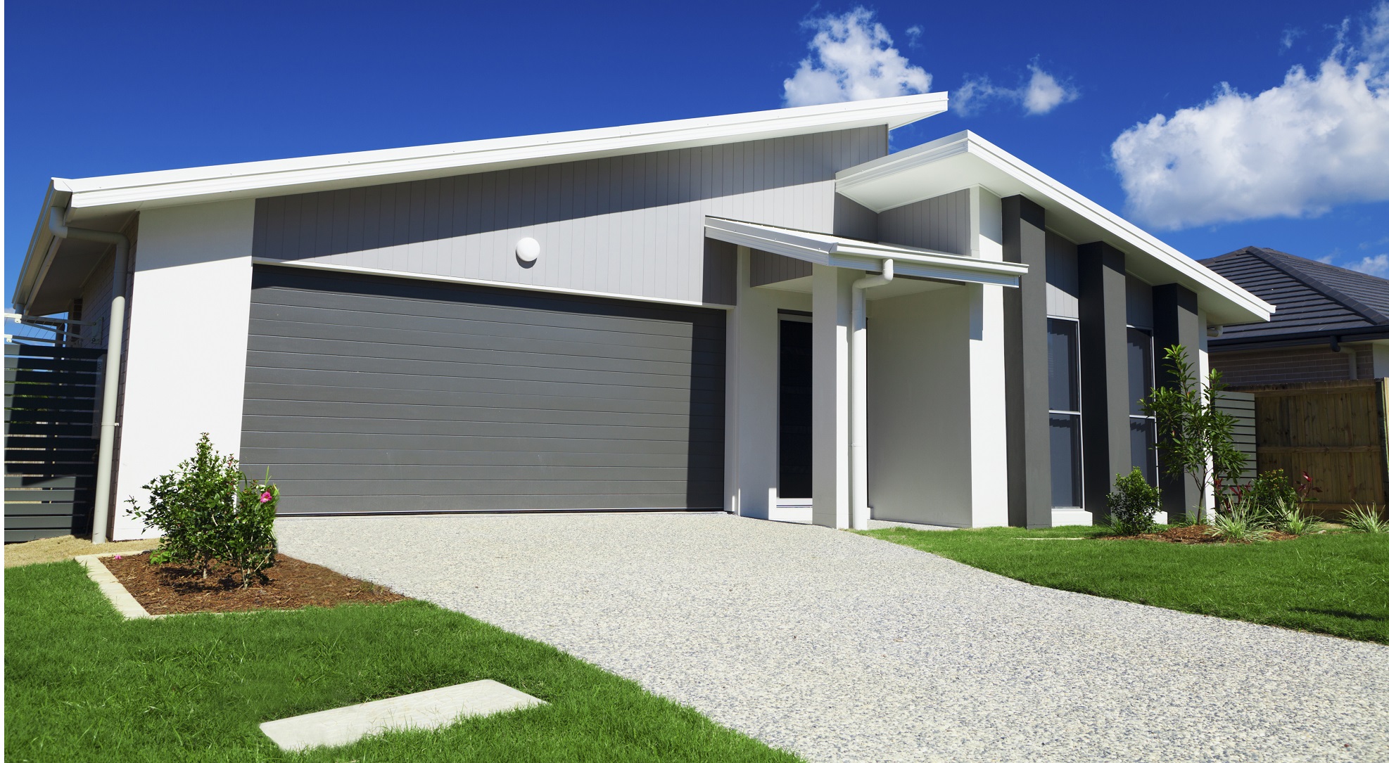 An exposed aggregate concrete driveway